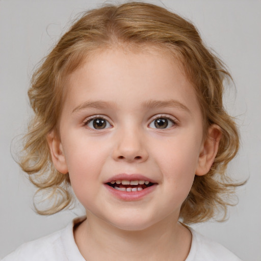 Joyful white child female with medium  brown hair and brown eyes