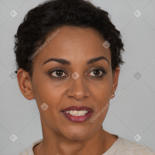 Joyful black young-adult female with short  brown hair and brown eyes