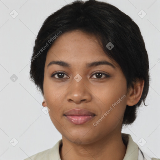 Joyful latino young-adult female with short  black hair and brown eyes