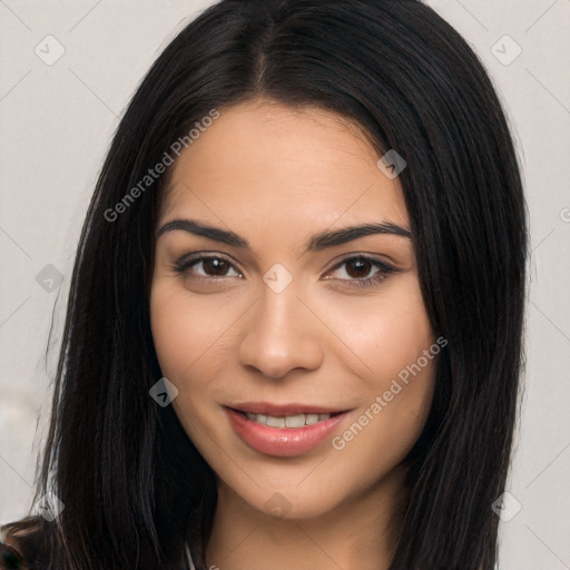 Joyful latino young-adult female with long  brown hair and brown eyes