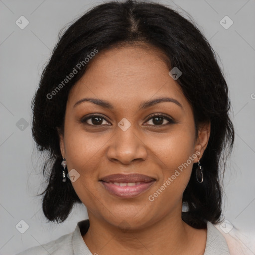 Joyful black young-adult female with medium  brown hair and brown eyes