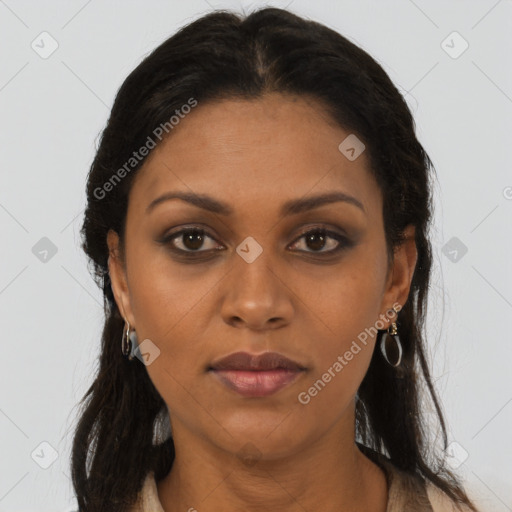 Joyful black young-adult female with long  brown hair and brown eyes