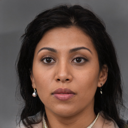 Neutral asian young-adult female with long  brown hair and brown eyes