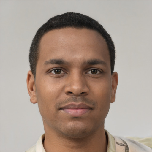 Neutral black young-adult male with short  black hair and brown eyes