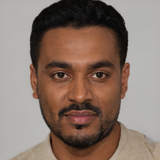 Neutral black young-adult male with short  black hair and brown eyes