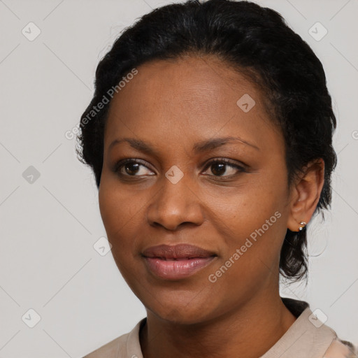 Joyful black young-adult female with medium  black hair and brown eyes