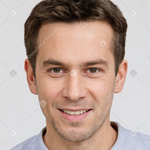 Joyful white young-adult male with short  brown hair and brown eyes