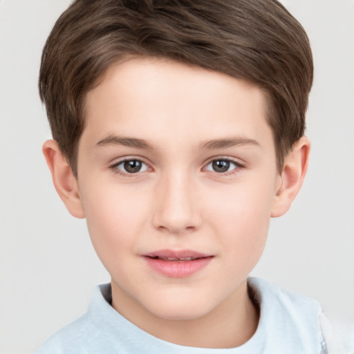 Joyful white child male with short  brown hair and brown eyes