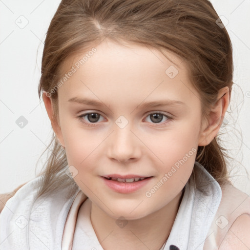 Joyful white child female with medium  brown hair and brown eyes