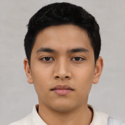 Neutral asian child male with short  black hair and brown eyes