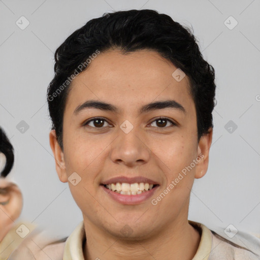 Joyful latino young-adult male with short  black hair and brown eyes