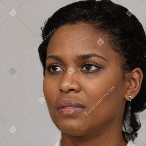 Neutral black young-adult female with short  black hair and brown eyes