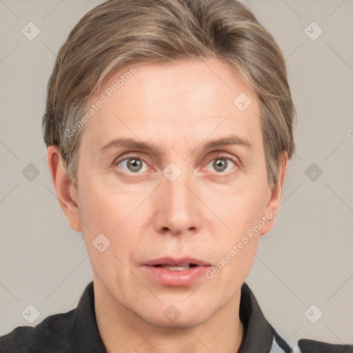 Neutral white adult male with short  brown hair and grey eyes