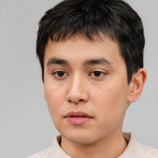 Neutral white young-adult male with short  black hair and brown eyes
