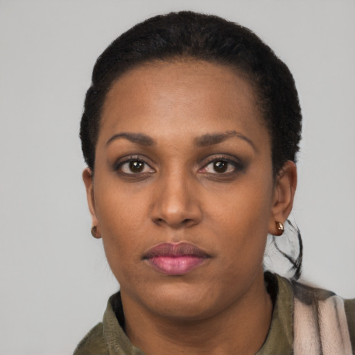 Neutral black young-adult female with short  black hair and brown eyes