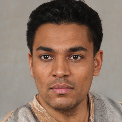 Neutral latino young-adult male with short  black hair and brown eyes