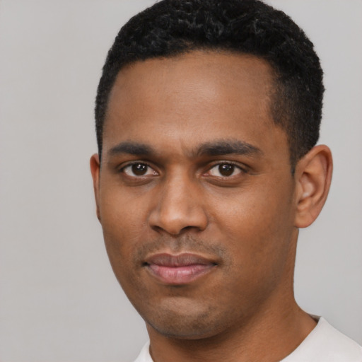 Neutral black young-adult male with short  black hair and brown eyes