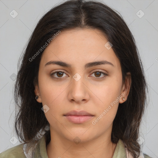 Neutral white young-adult female with medium  brown hair and brown eyes