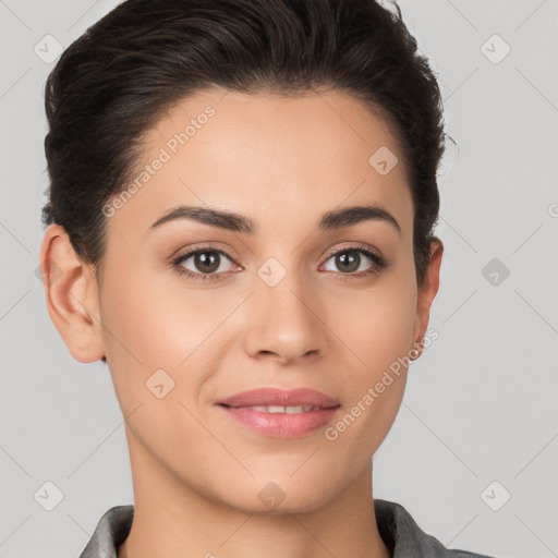 Joyful white young-adult female with short  brown hair and brown eyes