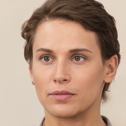 Neutral white young-adult female with short  brown hair and brown eyes