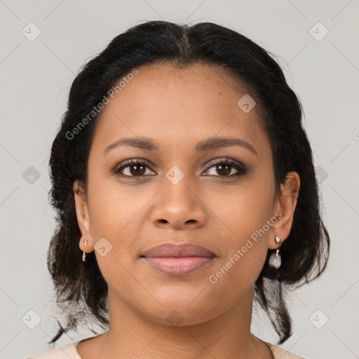 Joyful latino young-adult female with medium  brown hair and brown eyes
