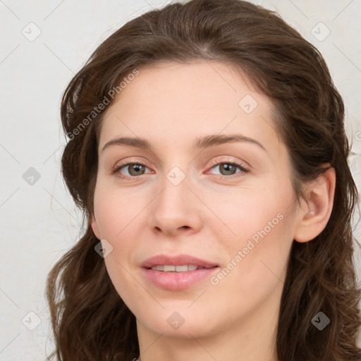 Joyful white young-adult female with long  brown hair and blue eyes