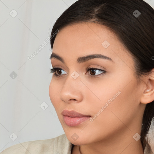 Neutral white young-adult female with long  brown hair and brown eyes