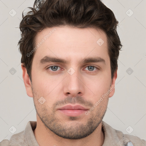 Neutral white young-adult male with short  brown hair and grey eyes