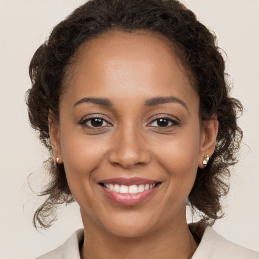 Joyful white young-adult female with medium  brown hair and brown eyes