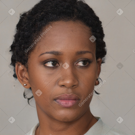 Neutral black young-adult female with short  brown hair and brown eyes