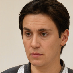 Neutral white adult male with short  brown hair and brown eyes