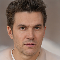 Neutral white adult male with short  brown hair and brown eyes