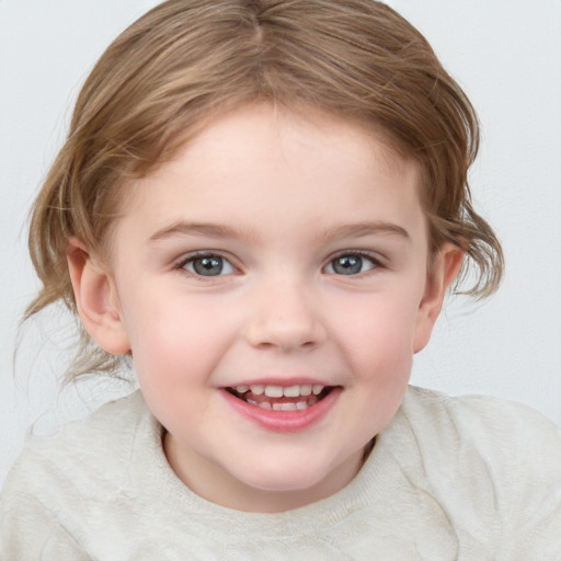 Joyful white child female with medium  brown hair and grey eyes