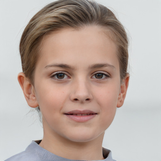 Joyful white child female with short  brown hair and grey eyes