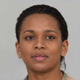 Neutral black young-adult female with short  brown hair and brown eyes