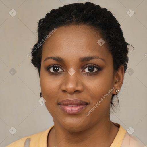 Joyful black young-adult female with medium  black hair and brown eyes