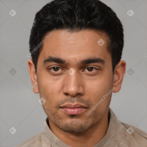 Neutral latino young-adult male with short  black hair and brown eyes