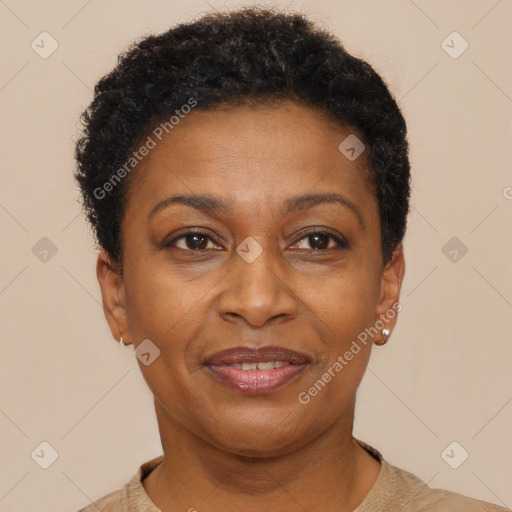 Joyful black adult female with short  brown hair and brown eyes