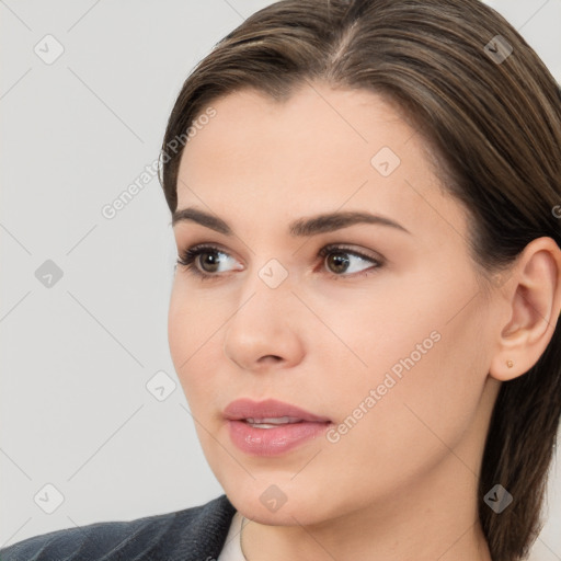 Neutral white young-adult female with medium  brown hair and brown eyes