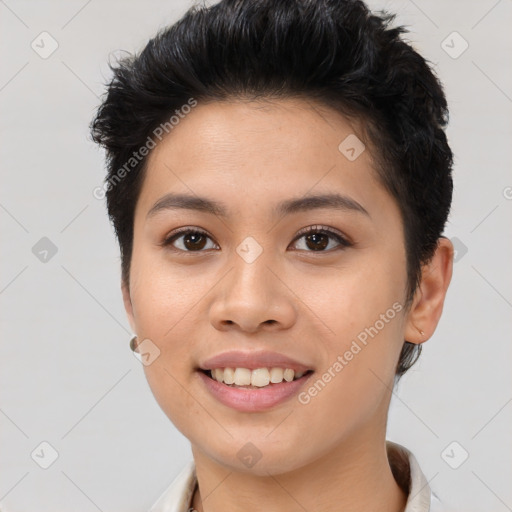 Joyful asian young-adult female with short  brown hair and brown eyes