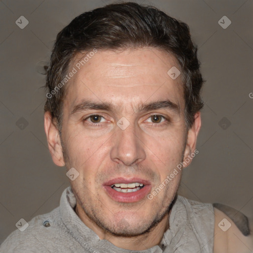 Joyful white adult male with short  brown hair and brown eyes