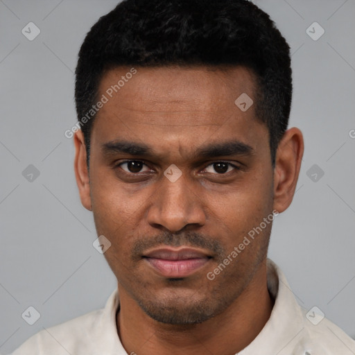Neutral latino young-adult male with short  black hair and brown eyes