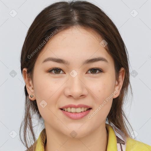 Joyful white young-adult female with medium  brown hair and brown eyes