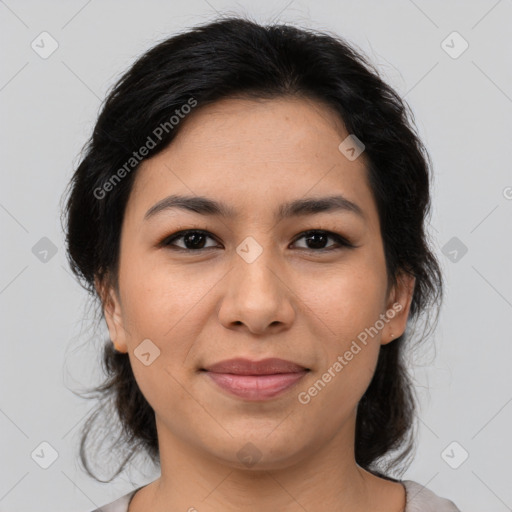 Joyful asian young-adult female with medium  brown hair and brown eyes