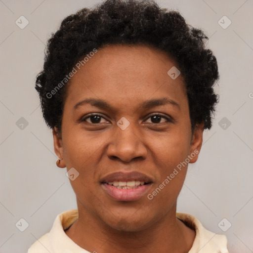 Joyful black adult female with short  brown hair and brown eyes