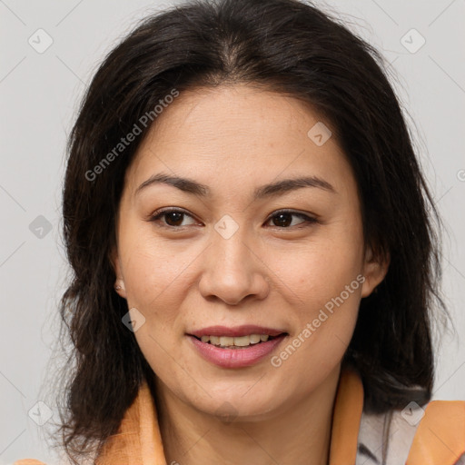 Joyful white adult female with medium  brown hair and brown eyes