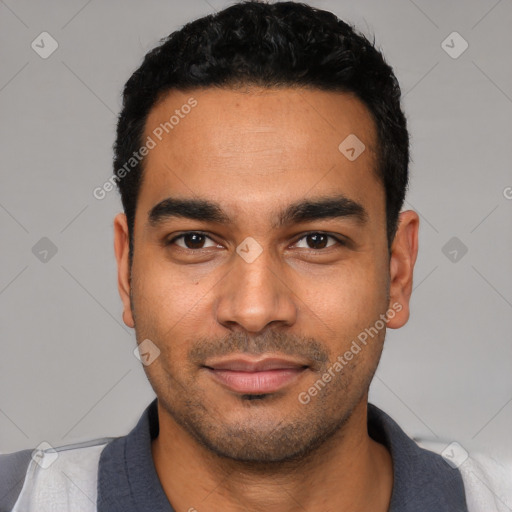 Joyful latino young-adult male with short  black hair and brown eyes