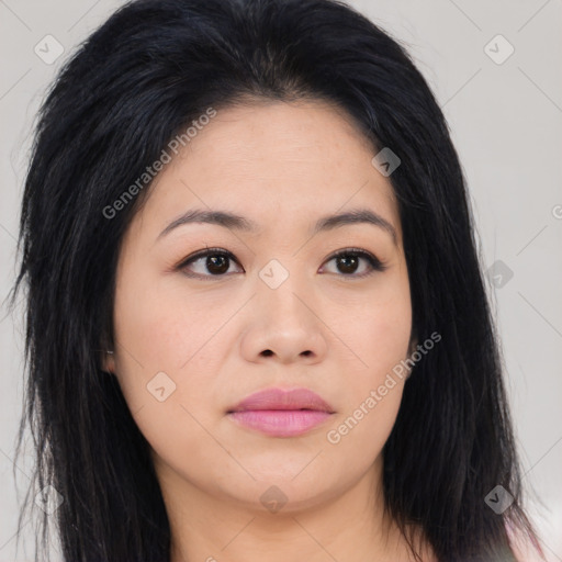 Joyful asian young-adult female with long  black hair and brown eyes