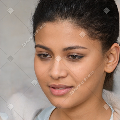 Joyful latino young-adult female with short  brown hair and brown eyes