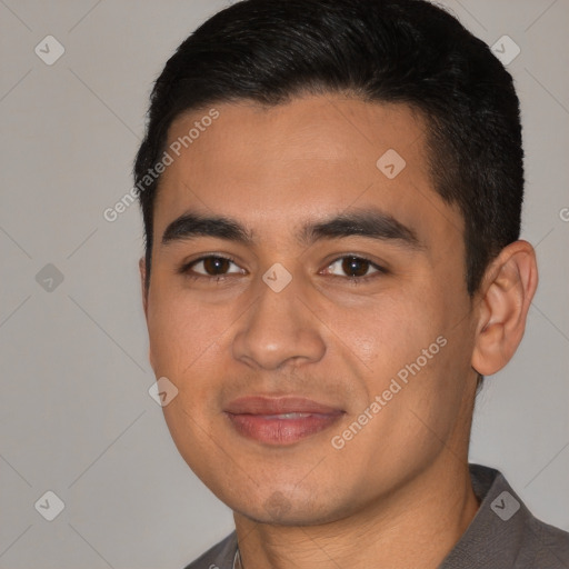 Joyful latino young-adult male with short  black hair and brown eyes